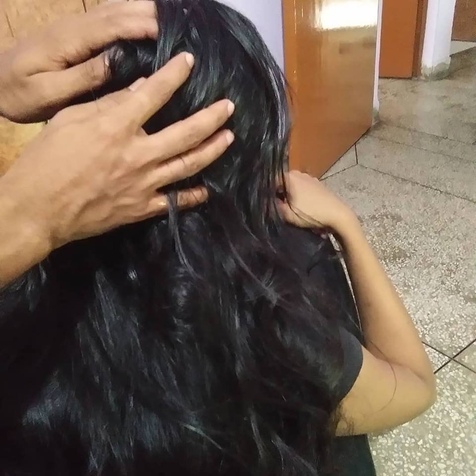 Coconut hair oil massage