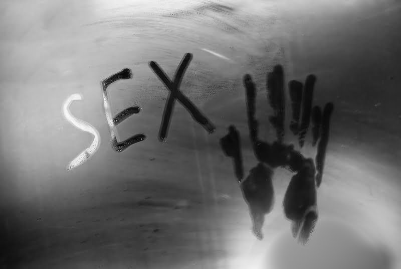 Inscription SEX on the Mirror